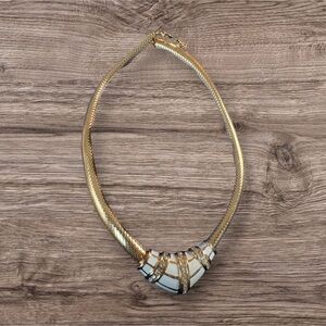 Elegant Gold and White Necklace